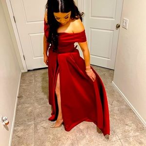 Formal red silk dress with leg slit. Small tear on over the shoulder stitching.